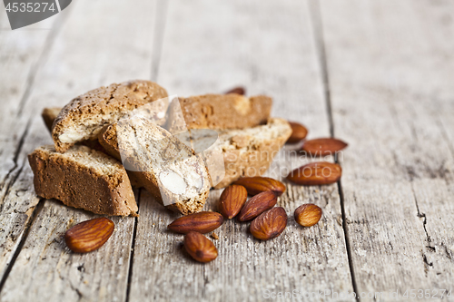 Image of Fresh homemade Italian cookies cantuccini heap and almond seeds 