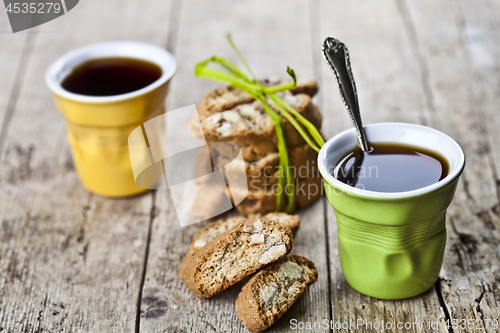 Image of Two cups of coffee, fresh Italian cookies cantuccini and almond 
