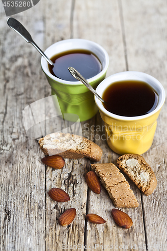 Image of Two cups of coffee and fresh Italian cookies cantuccini with alm