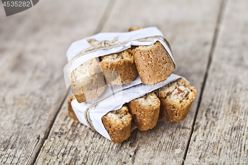 Image of Traditional Italian cookies cantuccini wid almonds on white pape