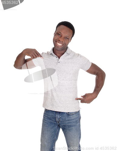 Image of African man standing and pointing to himself