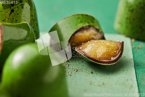 Image of green chocolate candy with jelly