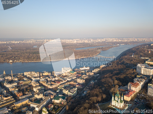 Image of Kiev, Ukraine - April 7, 2018: Panoramic view of the Dnieper River pedestrian bridge, Trukhanov Island and Andreevskaya church .