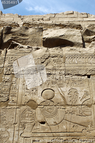 Image of Ancient stone wall with Egyptian hieroglyphs