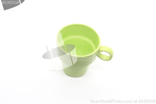 Image of Bright green ceramic cup with handle