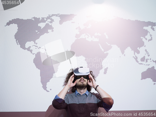 Image of businessman using VR-headset glasses of virtual reality