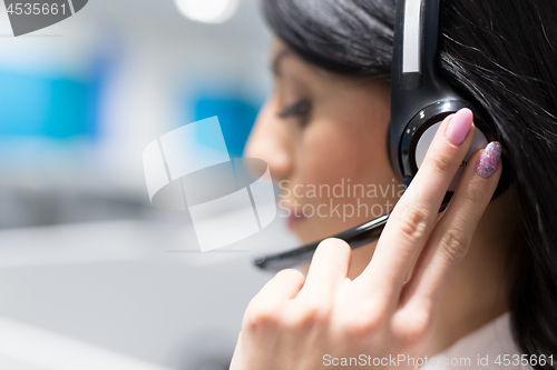 Image of female call centre operator doing her job