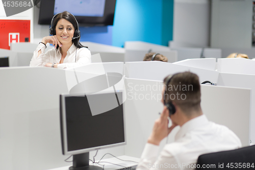 Image of female call centre operator doing her job