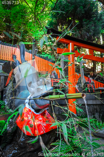 Image of Fox purification fountain at Fushimi Inari Taisha, Kyoto, Japan