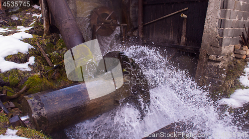 Image of Rural landscape with old watermill in woods