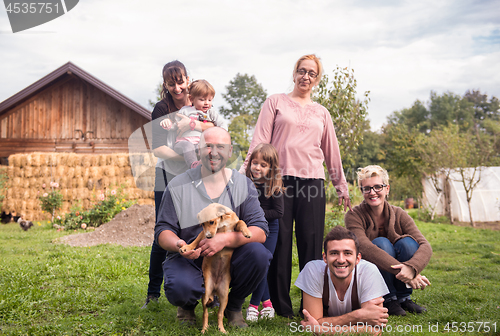 Image of portrait of happy family at farm