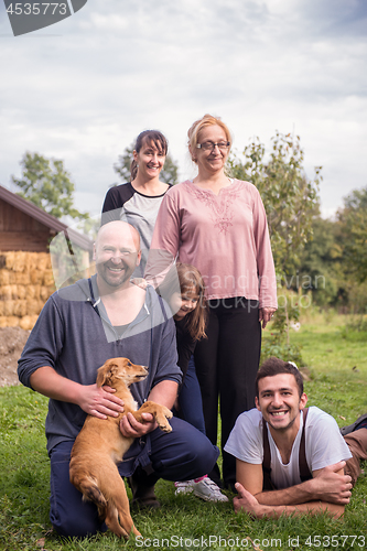 Image of portrait of happy family at farm