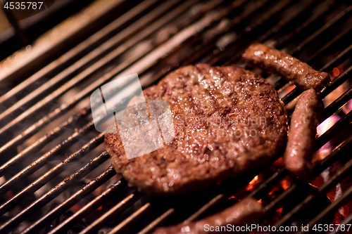 Image of delicious grilled meat on barbecue