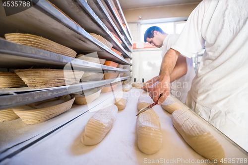 Image of bakers preparing the dough