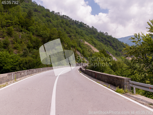 Image of asphalt road in beautiful countryside