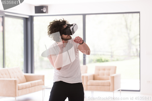Image of man using VR-headset glasses of virtual reality