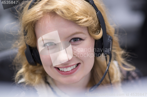 Image of female call centre operator doing her job