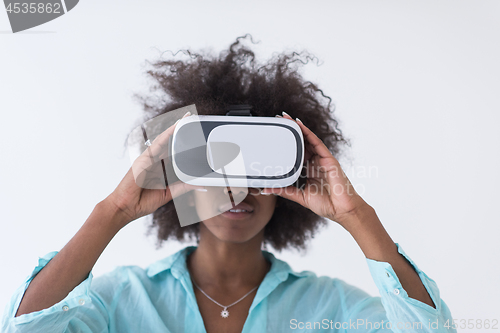 Image of black girl using VR headset glasses of virtual reality