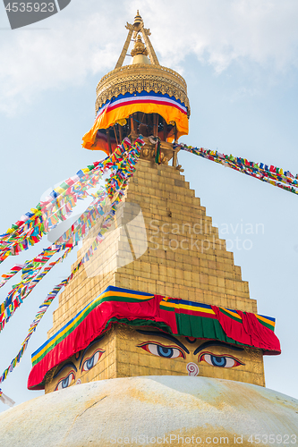 Image of Boudhanath Stupa and prayer flags in Kathmandu