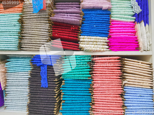 Image of Traditional lace fabric for sale, in the market