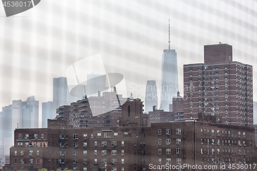 Image of New York Chinatown district and lower manhattan offices on the becakground