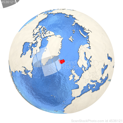 Image of Iceland in red on full globe isolated on white