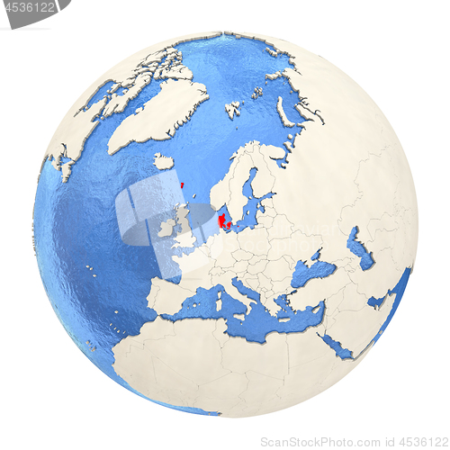 Image of Denmark in red on full globe isolated on white