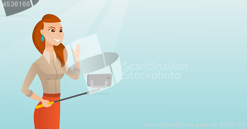 Image of Young caucasian hipster man making selfie.