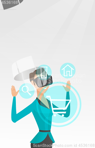 Image of Woman in virtual reality headset shopping online.