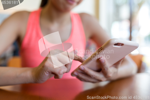 Image of Woman use of mobile phone