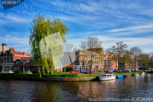 Image of Boats, houses and canal. Harlem, Netherlands