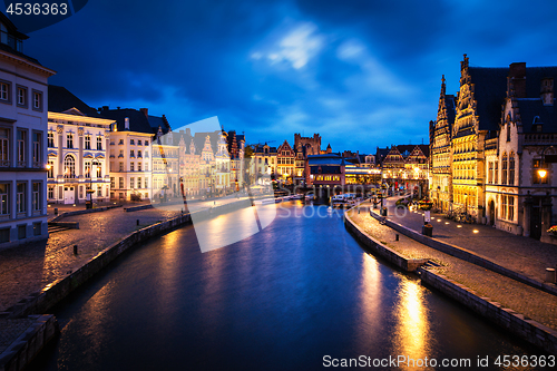 Image of Graslei street and canal in the evening. Ghent, Belgium