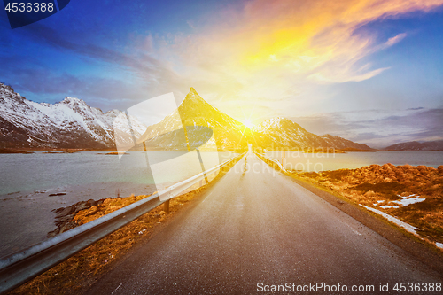 Image of Road in Norway in fjord on sunset