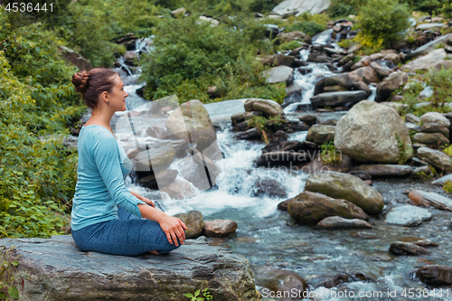 Image of Woman in Padmasana outdoors