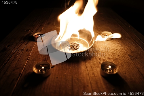 Image of Old pentagram burning in flames