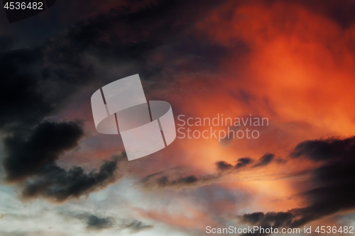 Image of Dramatic sky with dark red clouds