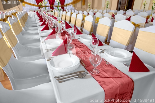 Image of Large dining hall with tables set up