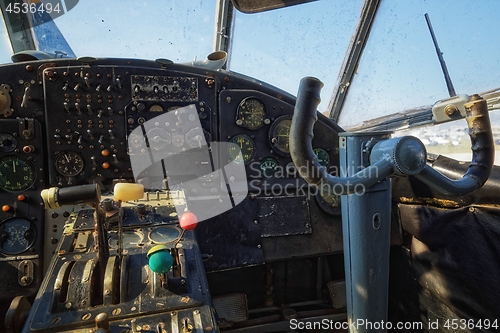 Image of Center console and throttles in an old airplane