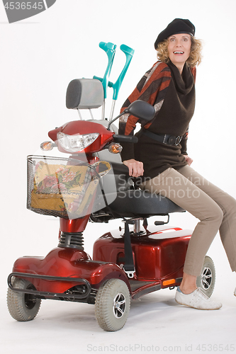 Image of Disabled elderly woman with scooter