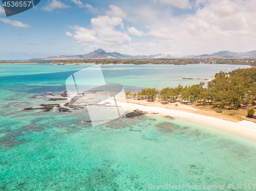 Image of Aerial view of beautiful tropical beach with turquoise sea. Tropical vacation paradise destination of D\'eau Douce and Ile aux Cerfs Mauritius