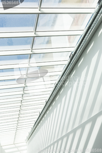 Image of Geometric shapes and patterns in contemporary architecture. Shadow on the white wall.