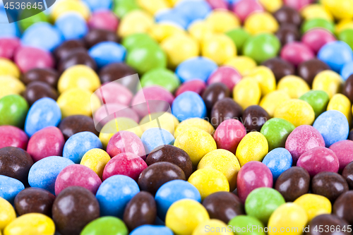 Image of Pile of delicious ainbow colorful chocolate candies.