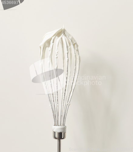 Image of Wire whisk with cream