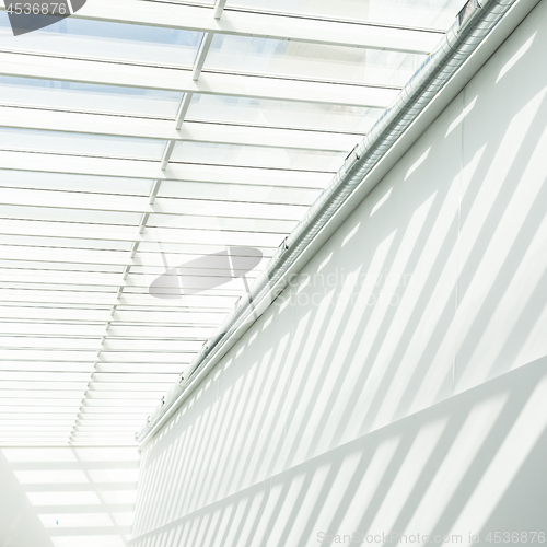 Image of Geometric shapes and patterns in contemporary architecture. Shadow on the white wall.