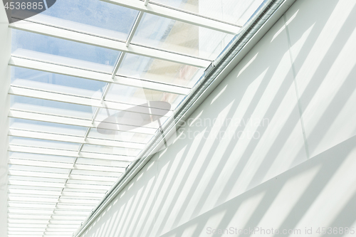 Image of Geometric shapes and patterns in contemporary architecture. Shadow on the white wall.