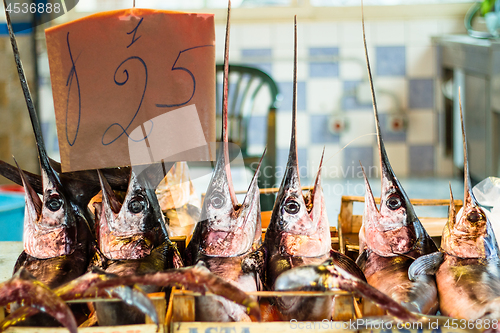 Image of Fresh swordfish being sold at the sicilian fish market