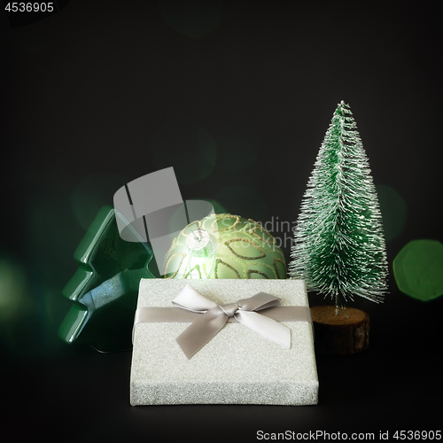 Image of Christmas decoration gift box on black background
