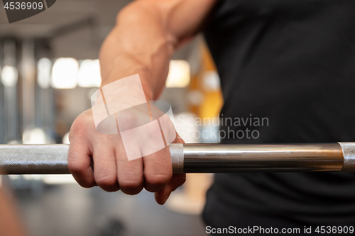 Image of grabbing a dumbbell