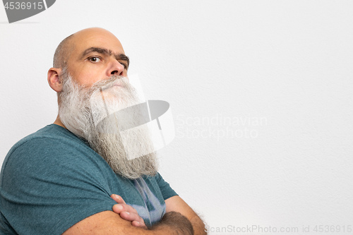 Image of skeptical looking bearded man