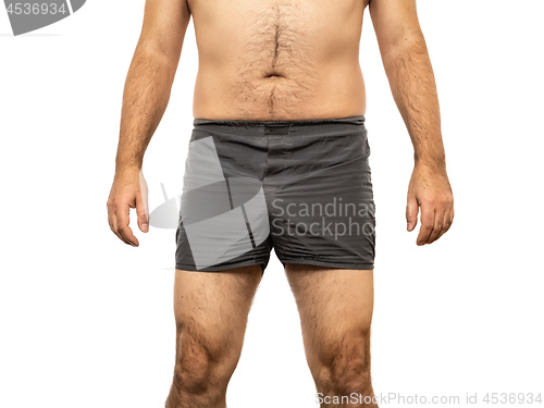 Image of middle age male torso grey pants